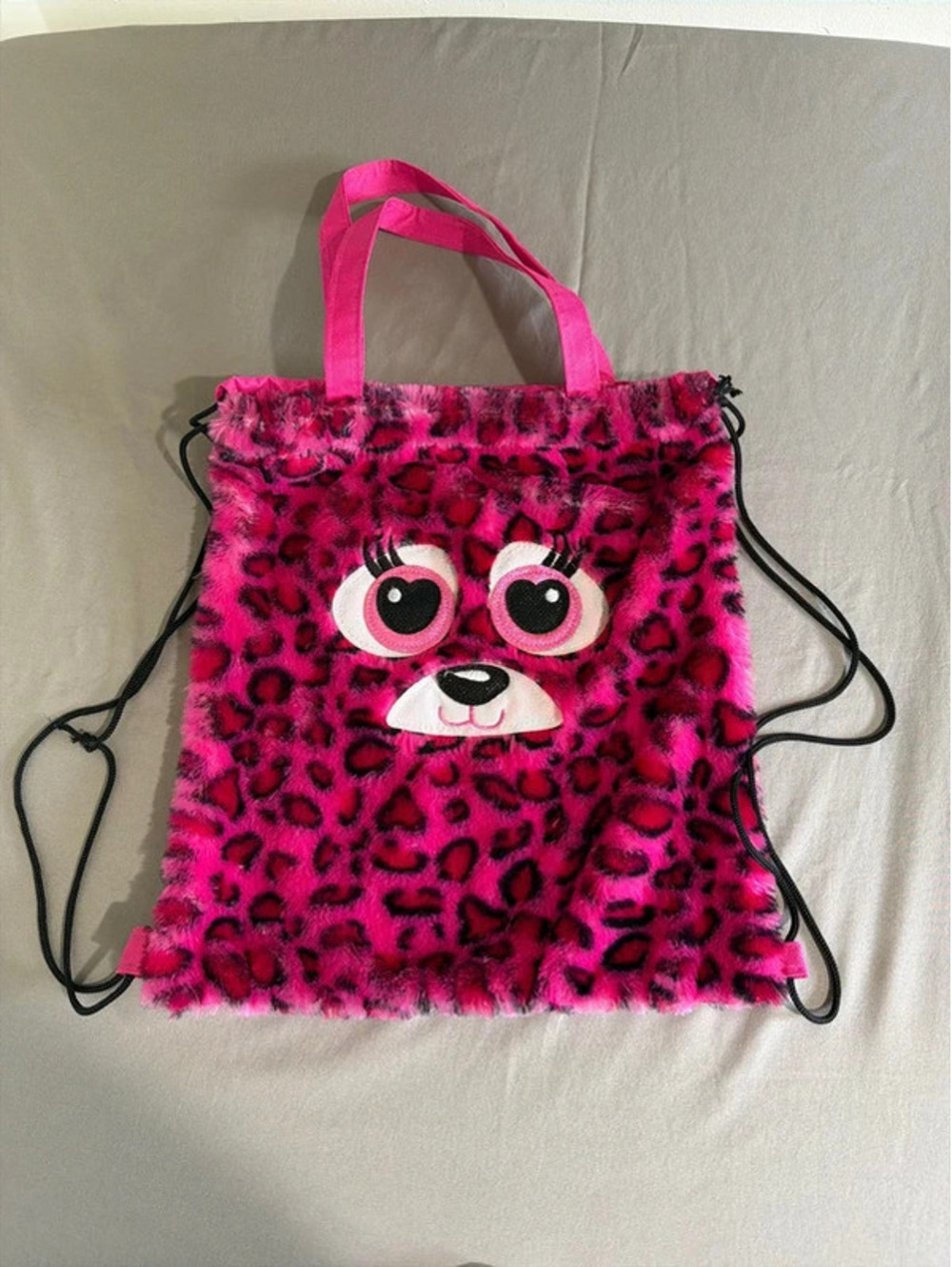 Pink Leopard Print Faux Fur Drawstring Backpack with Cute Face Design